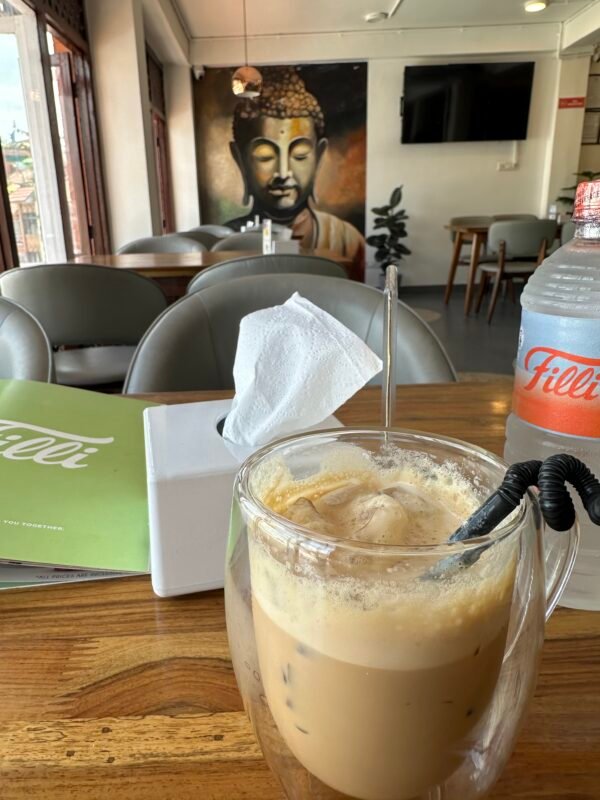 Drinking a chai latte in Kathamndu Nepal